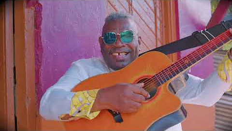 Dr Lester Lewis Christmas Roun Di Corna