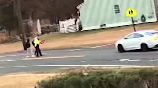 Crossing guard struck by vehicle while walking kids across New Jersey street