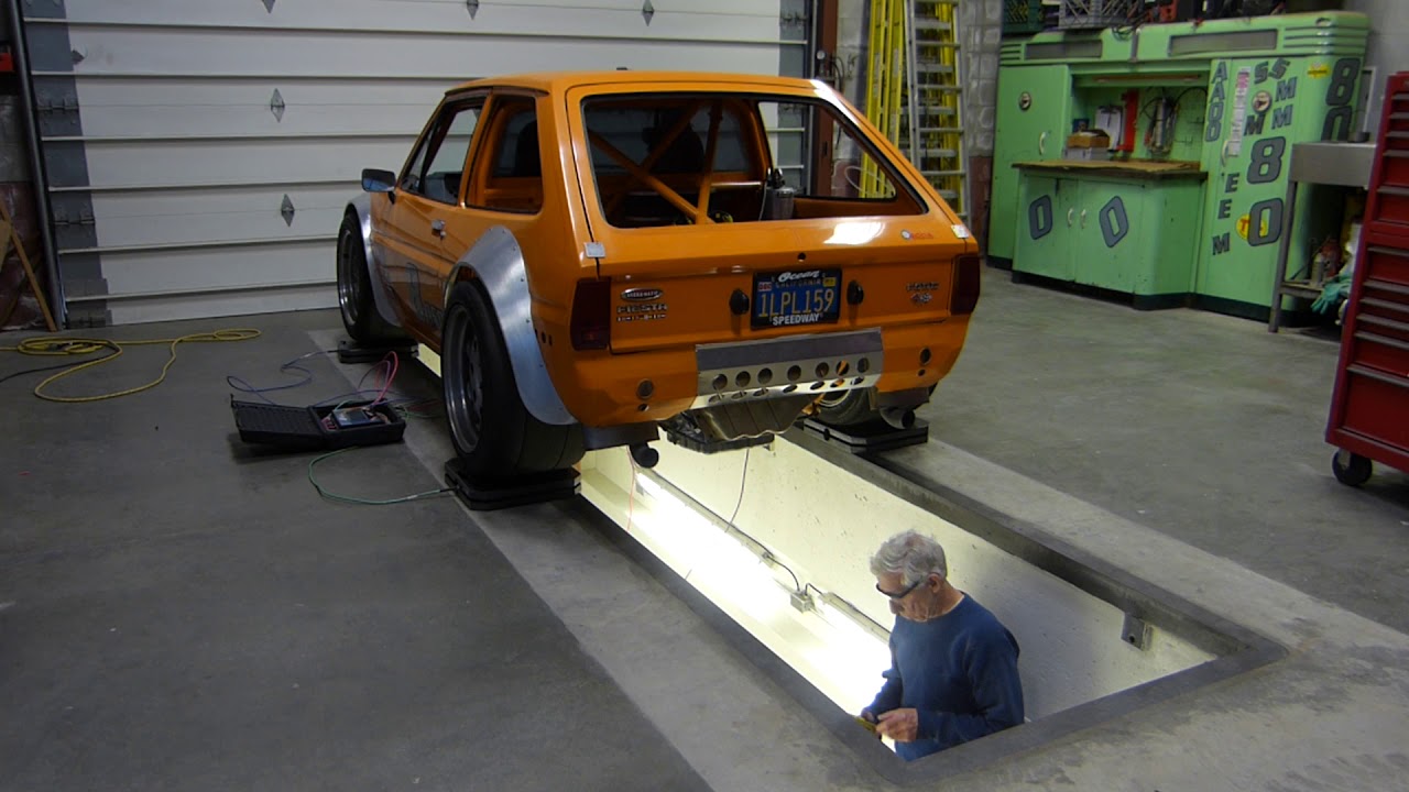 Using a pit as a lift, easy way to get car on scale pads YouTube