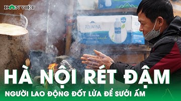 Hà Nội rét đậm, người lao động đốt lửa để sưởi ấm trên hè phố | Báo điện tử Dân Việt