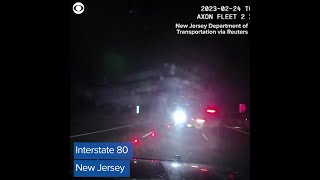 Dash cam captures moment tractor-trailer slams into unoccupied police vehicles