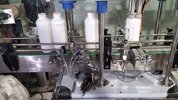 Máy vặn nắp chai tự động