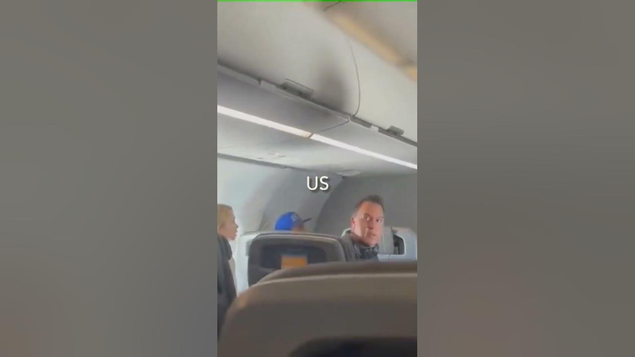 Man Punching American Airlines Flight Attendant Midair Passenger