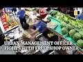 Urban management officer fights with fruit shop owner in China