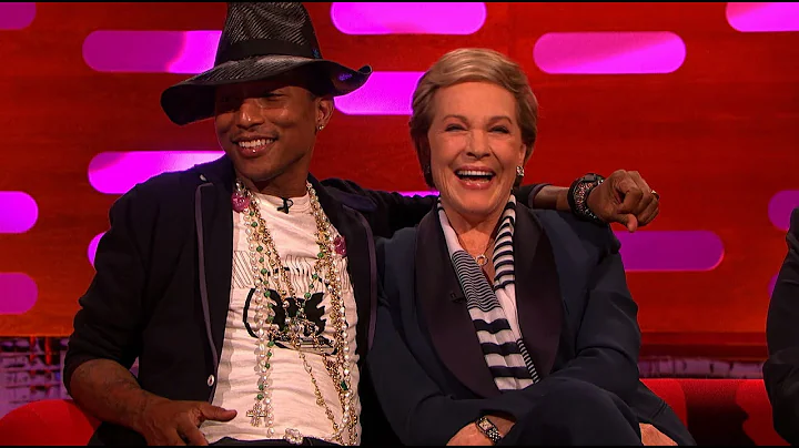 Pharrell competes for the attention of Julie Andre...