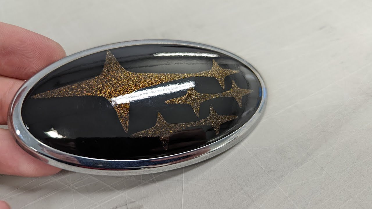 Subaru emblem overlay with Gloss black and KPMF gloss copper black starlight vinyl.