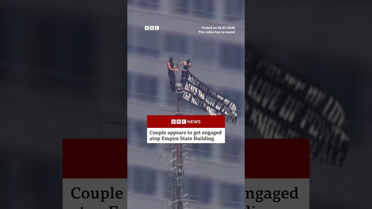 Couple appear to get engaged atop Empire State Building. #BBCNews