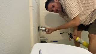 Remove stuck shower faucet handles