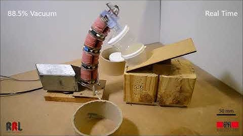 Vacuum-powered suction manipulation with a continuum robot