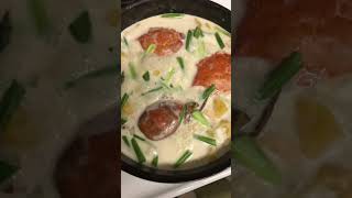 Ginataang kalabasa with crabs and shrimps in coconut milk 