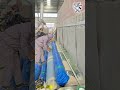 The workers quickly packed the processed slope protection and reinforcement blankets