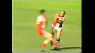 Tony Lockett caves in Peter Caven's lid