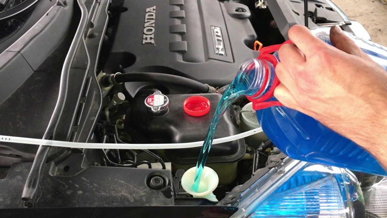 How to fill up windscreen washer fluid reservoir HONDA CRV - YouTube