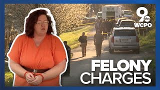 Woman accused of helping husband get away after killing 2