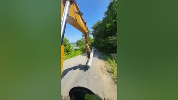 The process of excavators transporting utility poles- Good tools and machinery make work easy