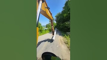 The process of excavators transporting utility poles- Good tools and machinery make work easy