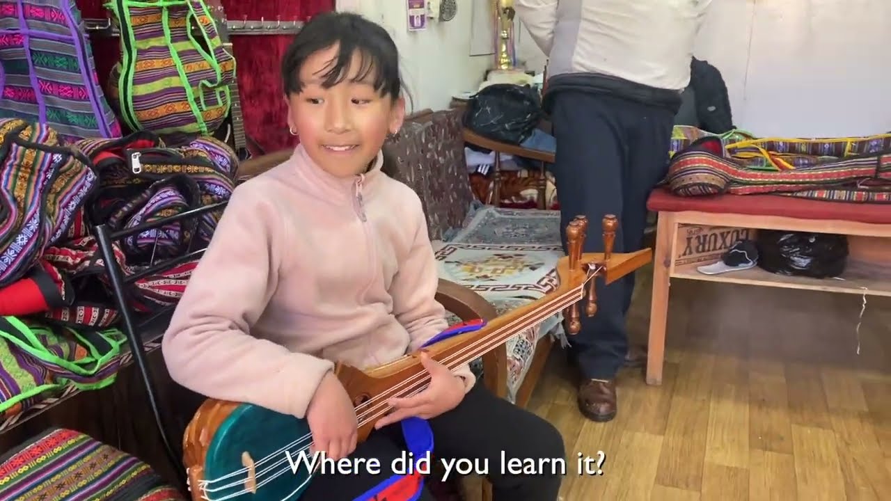 Little Girl Plays Tibetan Guitar in McLeodganj