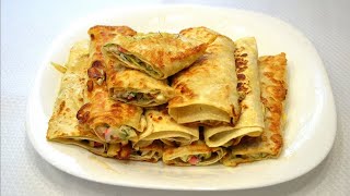Жареный лаваш с начинкой./Fried pita bread with stuffing. Жареный лаваш с начинкой./Fried pita bread with stuffing.