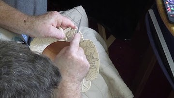 Nautilus carving the seashell