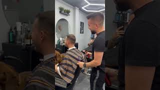 Loyal Dog "Protects" Owner from Barber