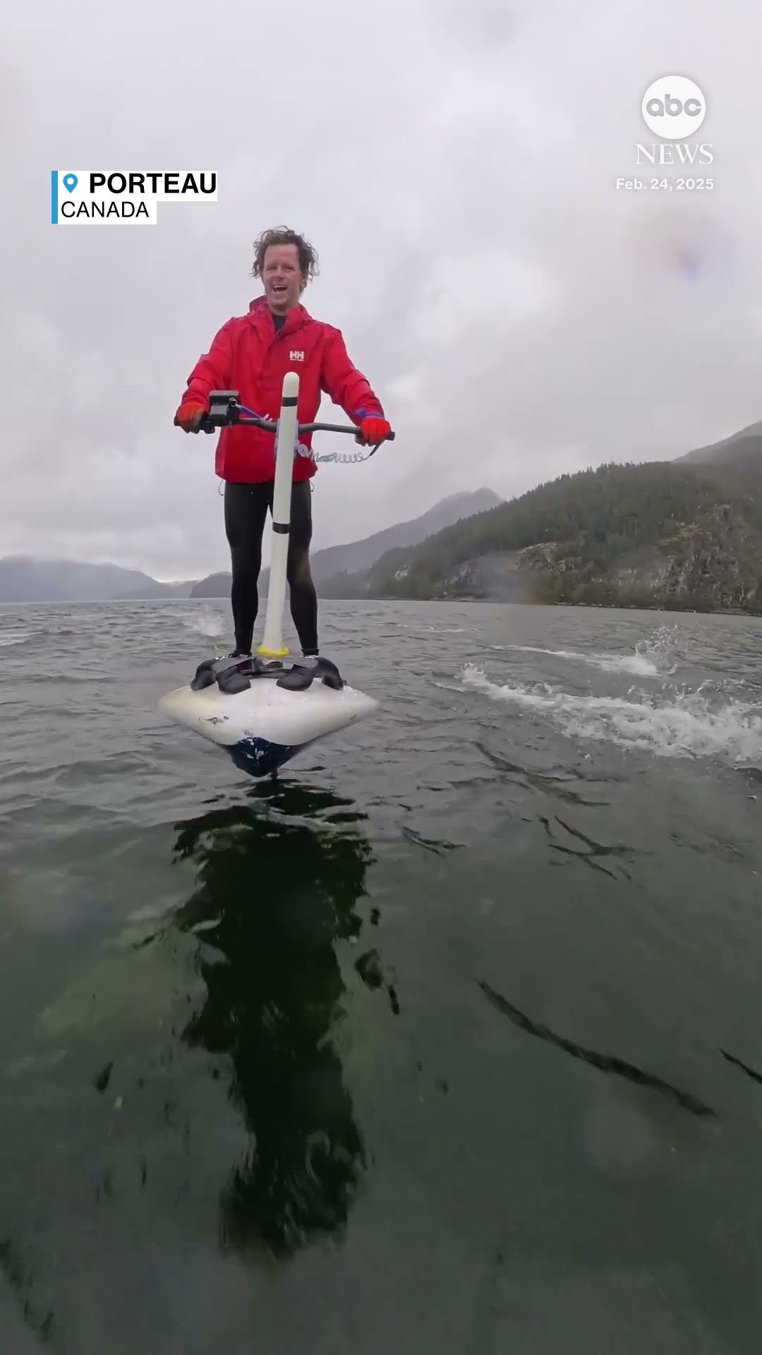 Hydrofoil boarder has close encounter with dolphins