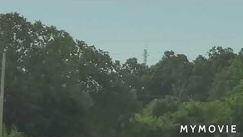 Red and white tower with dual strobe
