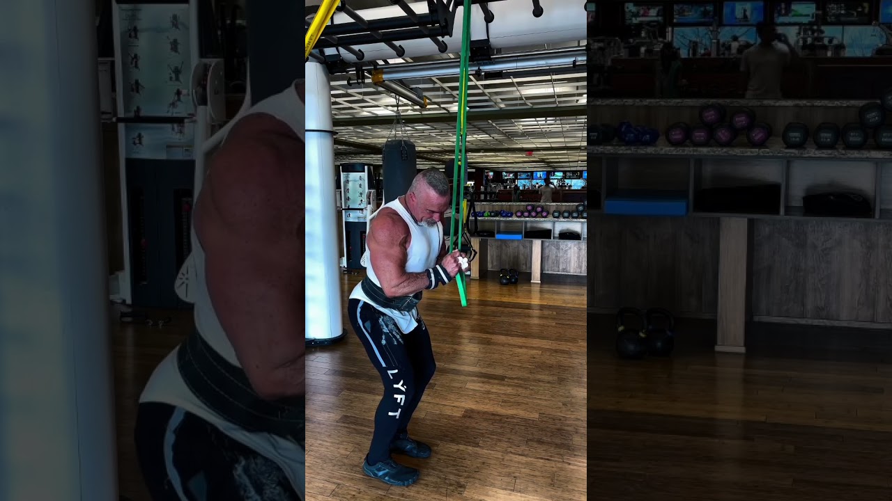 Resistance band pushdowns are the perfect finisher for your tricep workout to get that last little