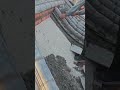 Installation of roof tiles on a roof with cement as reinforcement #youtubeshorts