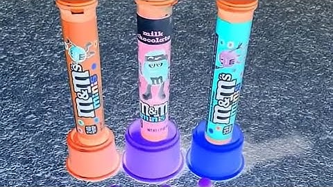 Which ringtone you like the most #compilation #funnyvideo #candies #m&ms #balls #colorfulballs 