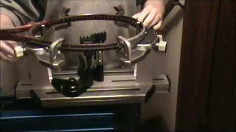 Troubleshooting racquet mounting on a 6pt. stringing machine