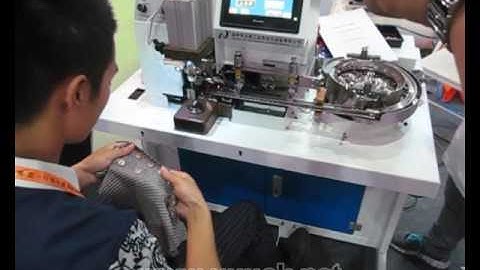 Automatic button making machine