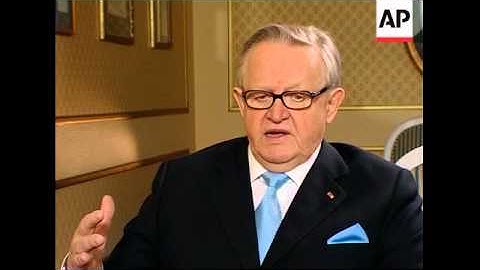 I/v with laureate, with children, lights flame