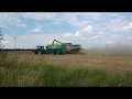 Claas Lexion 770 Terra Trac und John Deere Abfahrer mit Hawe ÜLW