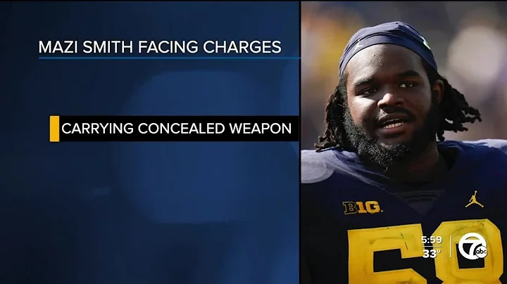 U-M DL Mazi Smith charged with carrying a concealed weapon, will continue to be with team