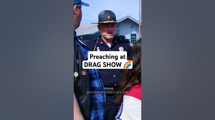 Cop Escorts Preacher Through DRAG Show