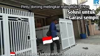 Pintu garasi siliding  praktis kuat aman kokoh solusi lahan garasi sempit