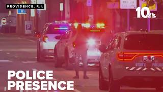 Large group of police seen searching area in Providence