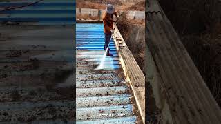 High Pressure Washing of a Weathered Corrugated Roof