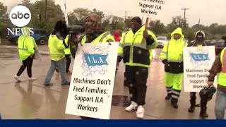 Dockworkers suspend strike until January; tentative agreement reached