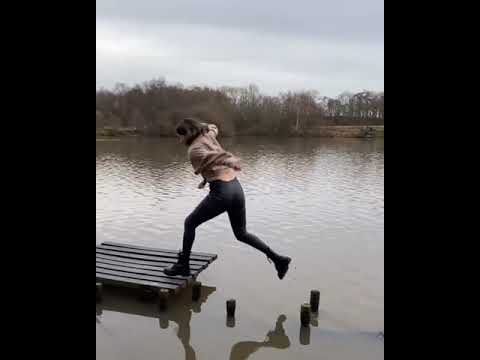 Guy bets girl that she can't make it to a floating dock, she proves him wrong!
