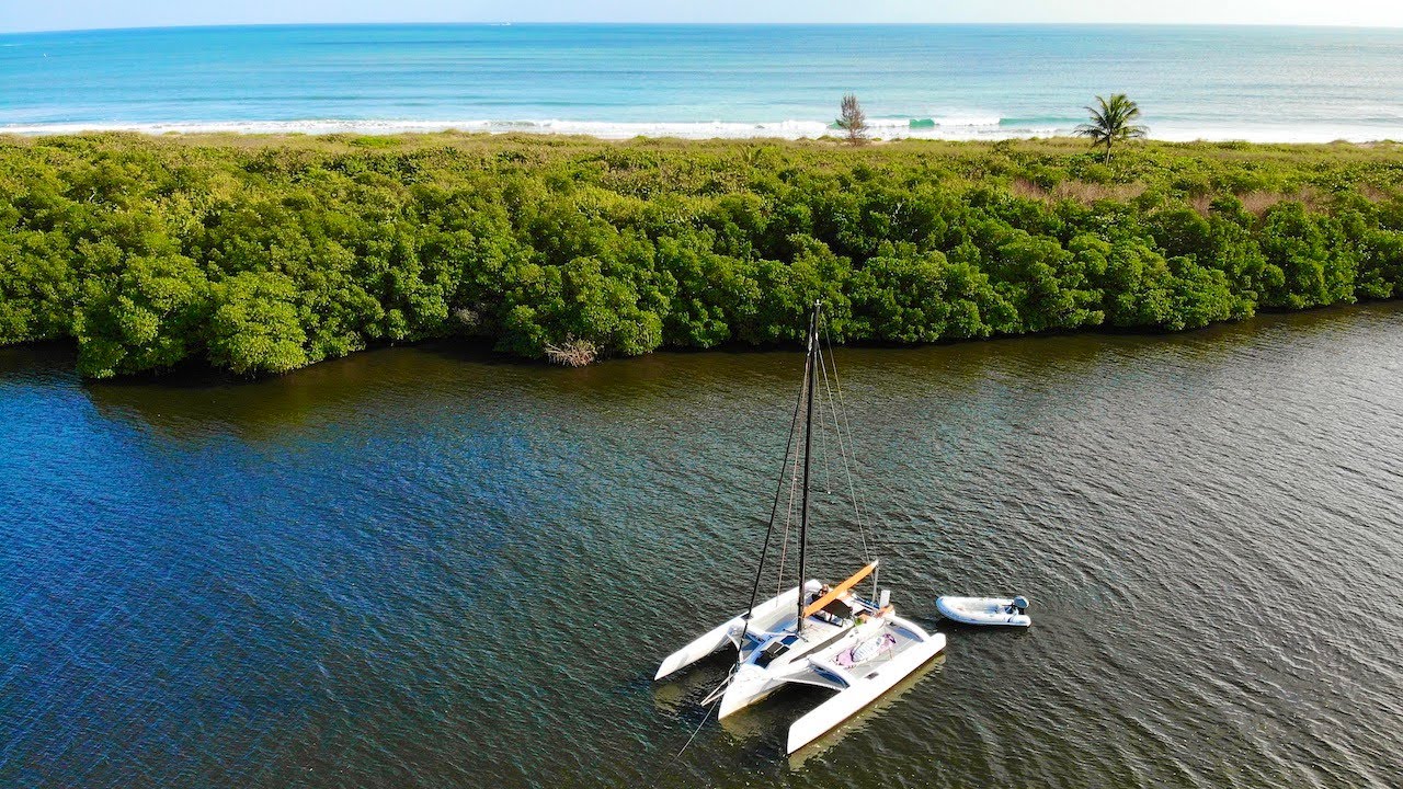 Trimaran Sailing to a PERFECT Surfing Anchorage!