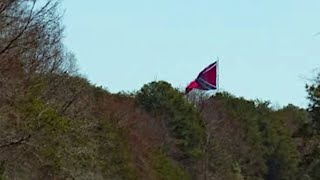 Confederate flag that can be seen from I-64 faces zoning battle