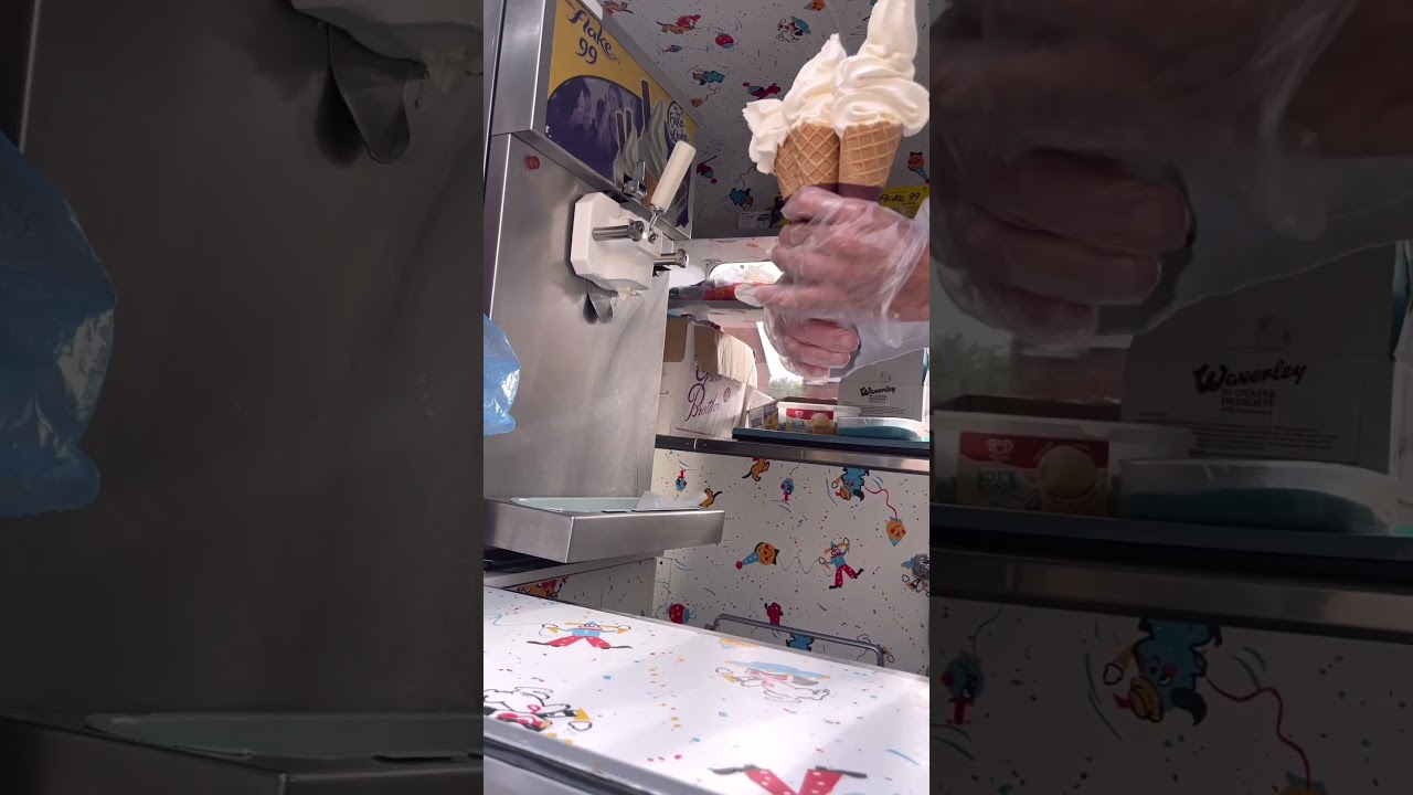 3 waffle cones with strawberry sauce on top 