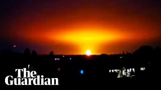 Fire colours the horizon after lightning causes explosion at recycling plant