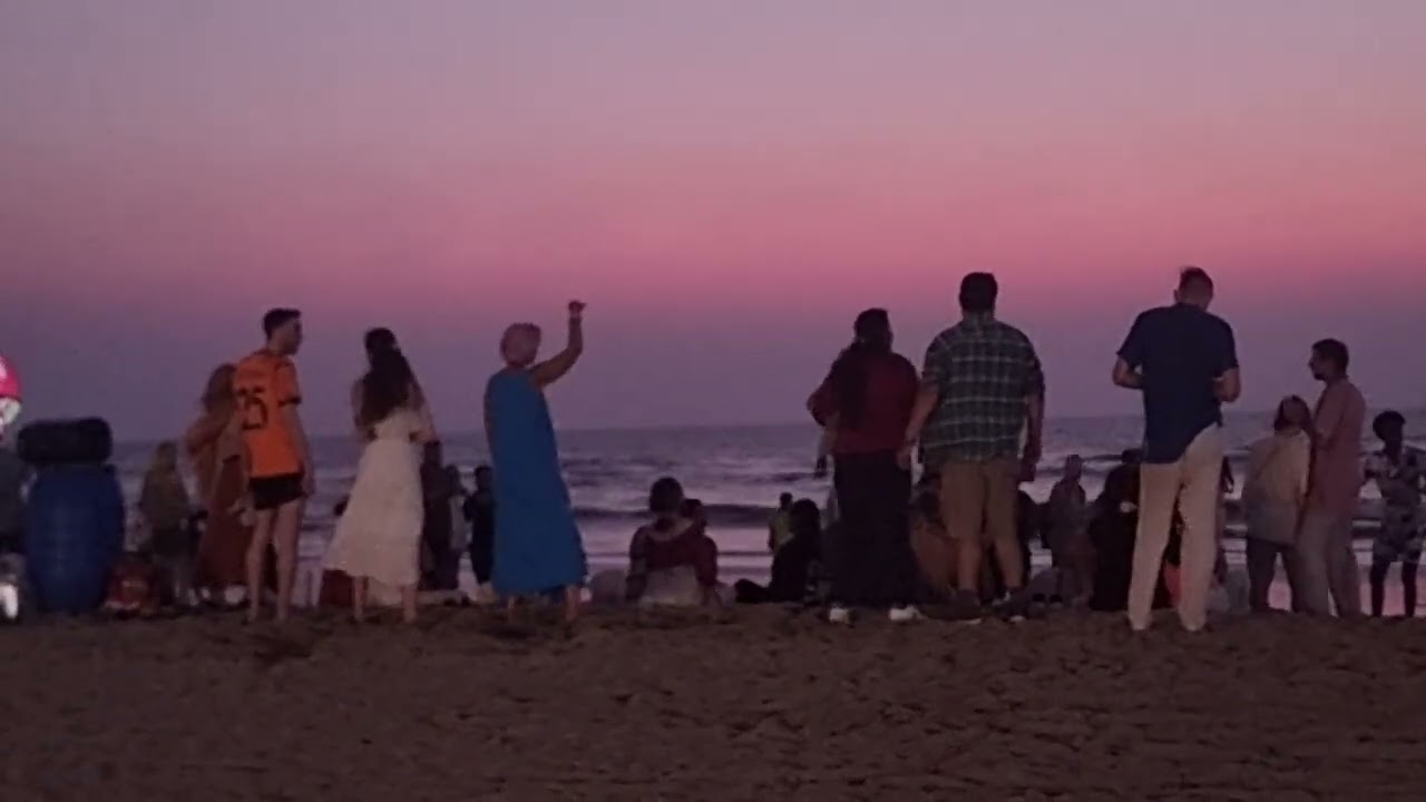 Hari Krsnas and Shiva Moon in Arambol at Sunset .