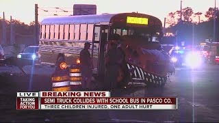 School bus and semi-truck collide in Pasco, children hurt