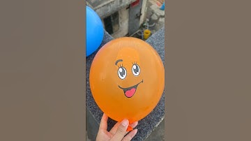 Experiment: Will a water balloon explode if it rolls down a tall building? 💥🎈 #balloon