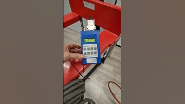 Low frequency demagnetization of a steel rod