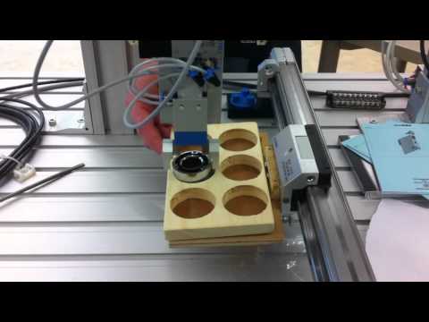 Programming a two axis servo pneumatic machine