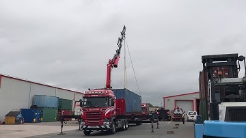 Unloading 40’ fo container by lorry loader crane truck Fassi crane containers for sale